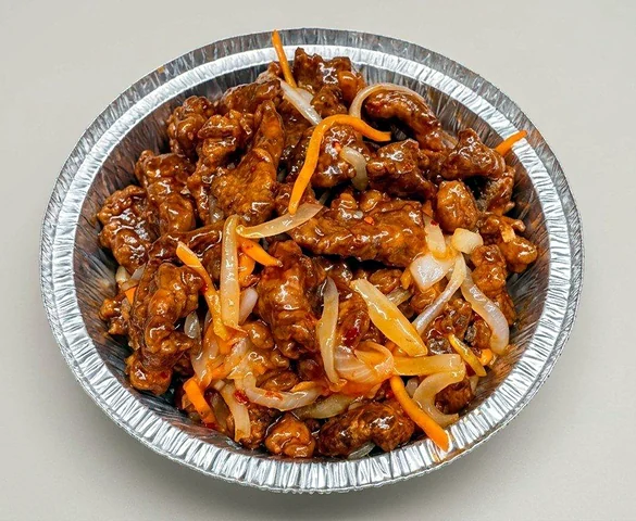 Dry ginger beef with carrot strips